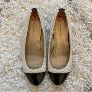 White and Black Bandolino Flats